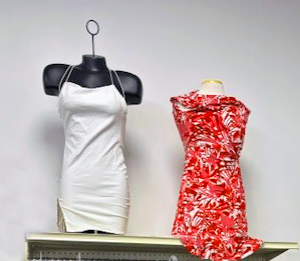 Two short dresses one white one red with white flowers